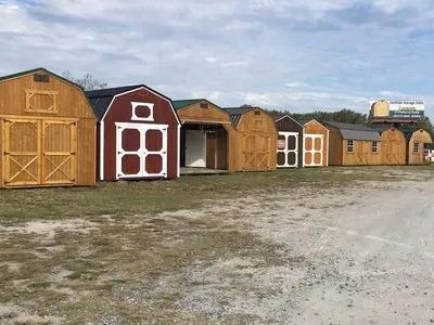 A selection of Old Hickory Buildings on a sales lot.